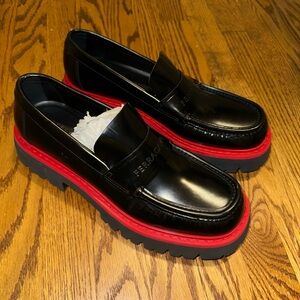 Salvatore Ferragamo Black Fergal Logo Debossed Loafers